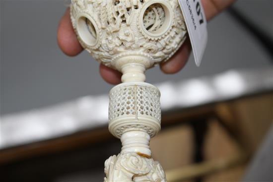 A 19th century Chinese carved ivory concentric ball on stand, height 35cm